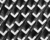 A close-up, abstract view of a textured surface with a repeating pattern of L-shaped elements. Produktbild-Vorschau