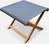 A single folding stool with a blue fabric seat and wooden legs, presented on a white background. Produktbild-Vorschau