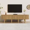 A TV stand with a television on the wall above it, in a living room setting. Produktbild-Vorschau