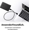 A black external hard drive connected to a laptop via a USB cable, with German text below. Produktbild-Vorschau