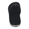A top-down view of a black Crocs flip-flop. Produktbild-Vorschau
