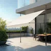 A modern balcony with a retractable awning providing shade over a dining set. Produktbild-Vorschau