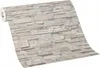 A roll of wallpaper with a stone brick pattern. Anteprima dell’immagine prodotto