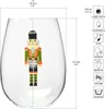 A clear glass wine glass with a nutcracker illustration and measurement indicators. Produktbild-Vorschau