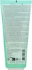 A close-up of the back of a green squeeze tube of cleanser, showing text and logos. Voir les images du produit
