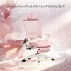 A pink ergonomic office chair is displayed with balloons and lace, suggesting a celebratory or decorative context. Náhled obrázku produktu
