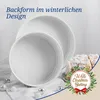 A white baking pan is shown with a slice of cake and Christmas decorations. Anteprima dell’immagine prodotto