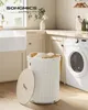 A laundry room scene with a washing machine and a SONGMICS laundry basket. Produktbild-Vorschau