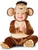 A baby wearing a monkey costume, sitting down and smiling. Anteprima dell’immagine prodotto