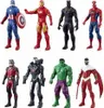 A collection of eight superhero action figures arranged in two rows. Voir les images du produit