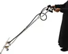 A person is holding a pressure washer accessory with wheels and a handle. Produktbild-Vorschau