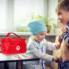 Two children playing doctor, one using a stethoscope on the other. Anteprima dell’immagine prodotto
