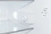 Interior view of a white refrigerator with a temperature control dial. Produktbild-Vorschau