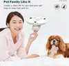 A woman is lying on a bed with a dog, holding a vacuum cleaner. Náhled obrázku produktu