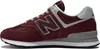 A side view of a New Balance sneaker. Voir les images du produit