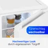 Close-up view of the interior of a white refrigerator with jars of food and a pull-out drawer. Text overlays describe features. Produktbild-Vorschau