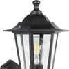 Close-up of a black outdoor lantern with a clear glass enclosure and an Edison-style LED bulb. Náhľad obrázku produktu