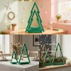 Collage of images showing green wooden Christmas tree decorations in different settings. Anteprima dell’immagine prodotto