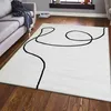 Tapis de salon moderne One-Line crème/noir design Voir les images du produit 1