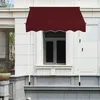 A burgundy awning is installed above a window on the exterior of a building. Náhled obrázku produktu