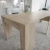 A close-up view of a light brown wooden table, likely an extendable console table, in a well-lit room with a blurred background. Produktbild-Vorschau