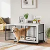 A golden retriever dog is walking out of a white and black dog crate in a well-lit room. Anteprima dell’immagine prodotto