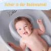 A baby is taking a bath in a baby bathtub with a bath seat. Produktbild-Vorschau