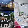 Collage of images showing solar string lights used in various outdoor and indoor settings, including a courtyard, garden, and a wedding reception. Anteprima dell’immagine prodotto