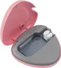 An open pink toothbrush sanitizer case with a gray interior. Náhľad obrázku produktu
