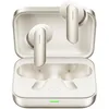 A pair of gold and white true wireless earbuds are shown inside their charging case, which is open. The charging case is also gold and white. Produktbild-Vorschau