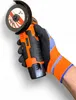 A hand wearing a glove holds a cordless angle grinder. Podgląd zdjęcia produktu