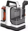 A portable carpet cleaner with a handle and water tanks. Náhled obrázku produktu