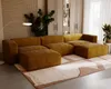 A modern living room with a large sectional sofa, a floor lamp, and built-in shelving. Náhled obrázku produktu