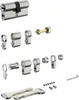 A collection of lock cylinder components and tools, laid out on a white background. Anteprima dell’immagine prodotto