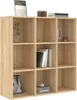 A wooden bookshelf with multiple compartments, some of which are filled with books and decorative items. Produktbild-Vorschau