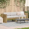 An outdoor patio scene with a wooden sofa, coffee table, and drinks. Produktbild-Vorschau