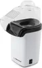 A white popcorn maker with a clear lid and black accents, positioned against a white background. Náhled obrázku produktu