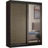 A wardrobe with sliding doors, one of which is mirrored, reflecting a bedroom scene. Náhled obrázku produktu