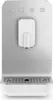 A front view of a white and silver SMEG coffee machine. Voir les images du produit
