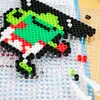 A close-up view of a fuse bead craft project in progress on a pegboard. Produktbild-Vorschau