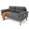 A dark gray sofa with an orange throw blanket draped over the armrest, shown against a white background. Produktbild-Vorschau