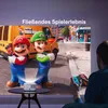 A person is playing a video game projected onto a wall by a mini projector. The game features characters from Super Mario Bros. Produktbild-Vorschau
