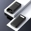 Two black power banks are displayed on white platforms against a dark background. Produktbild-Vorschau