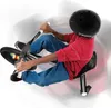 A child wearing a helmet rides a Razor RipRider 360 LightShow Dreirad. Voir les images du produit