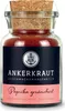 A glass jar of paprika with a cork lid, featuring a label with brand and product information. Voir les images du produit