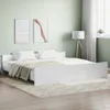 A white bed frame with pillows and a blanket in a bedroom with light green walls. Náhľad obrázku produktu