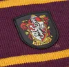 A close-up of a Gryffindor patch on a striped scarf. Náhled obrázku produktu