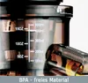 Close-up of a slow juicer with measurement markings. Produktbild-Vorschau