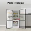 An open refrigerator with food items inside, and a dashed outline indicating a reversible door. Produktbild-Vorschau