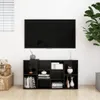 A black media console with a television mounted above it, in a room with a plant and some decorative items. Náhled obrázku produktu